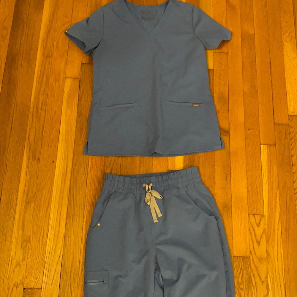 Figs scrub set ceil blue. High waisted joggers and two pocket top. Size small.